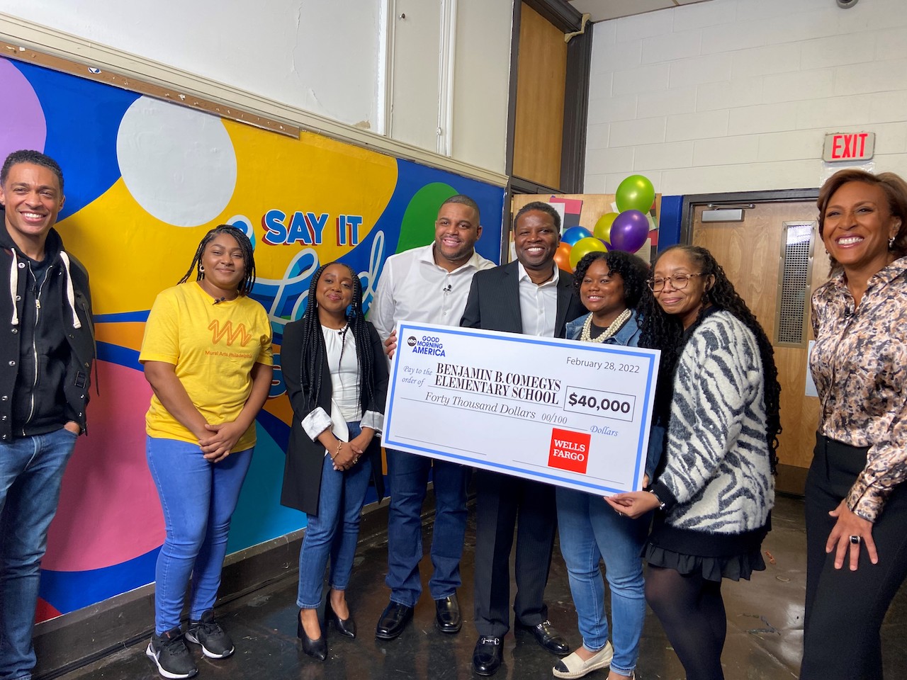 (From L to R) T.J. Holmes, Jamee Grigsby, Quinta Brunson, Mr. Robinson, Stephen Briggs, Xiomarra Robinson, Ms. Dupree (Comegys principal), Robin Roberts. Photo: Comegys Elementary School