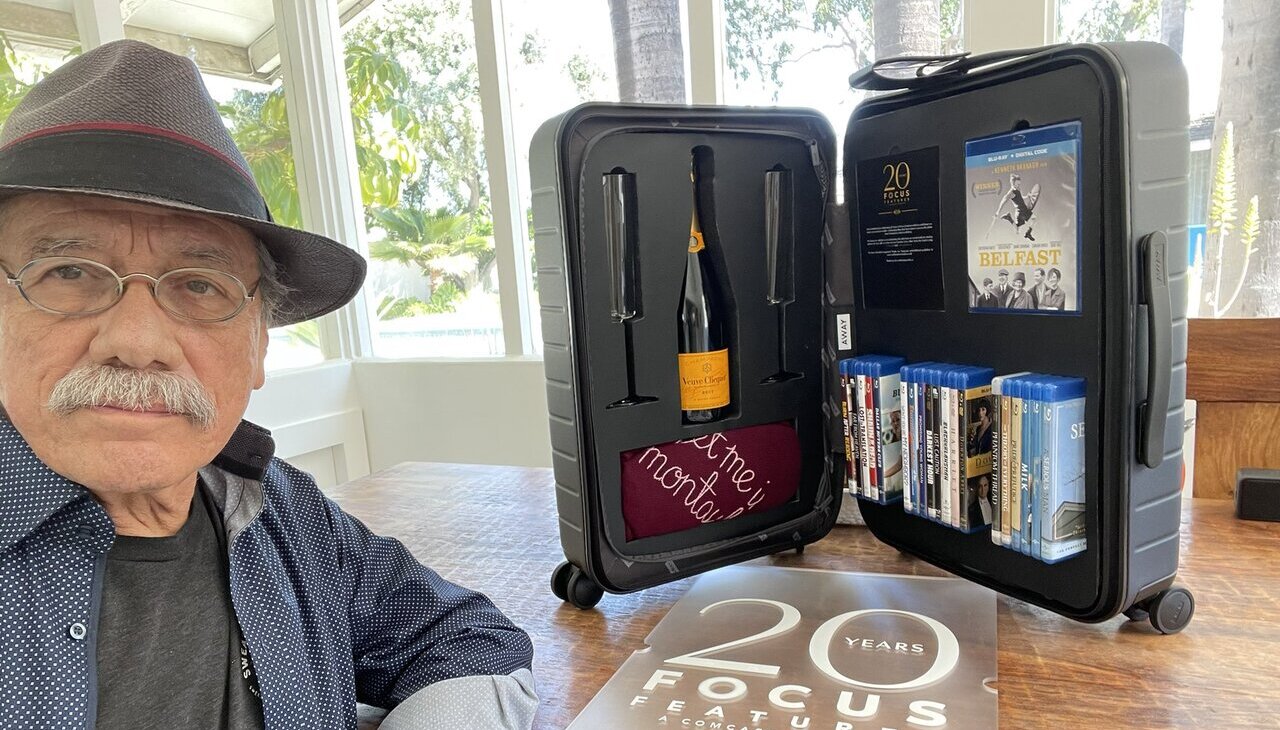Edward James Olmos with a collection case of wine. 