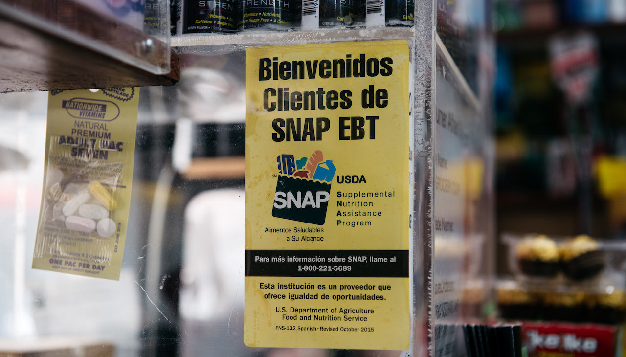 Sign that reads: SNAP EBT Clients Welcome. Photo: Scott Heins/Getty Images.