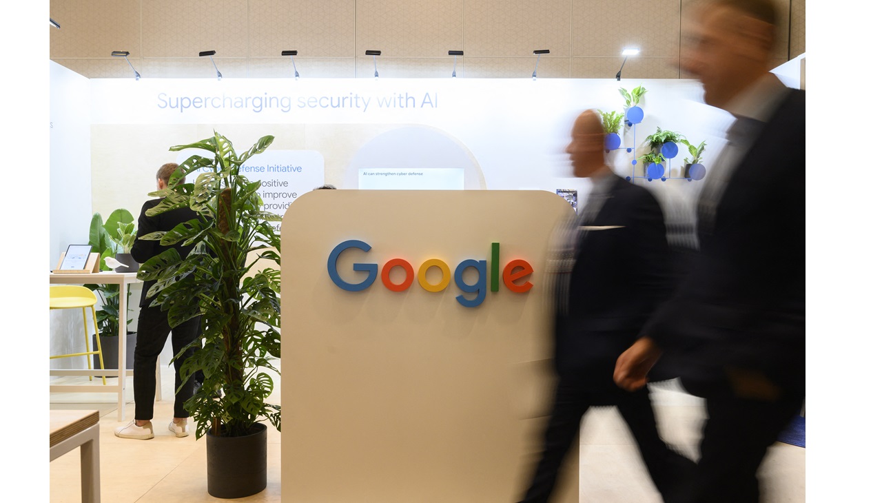 People at the Google headquarters. (Photo by Aleksander Kalka / NurPhoto / NurPhoto via AFP)