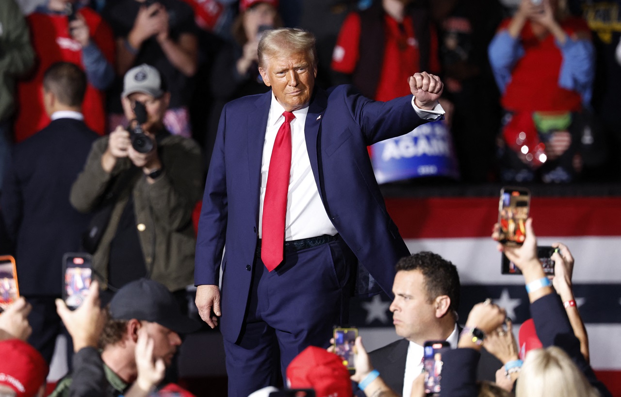 Donald Trump durante un miting. Photo by KAMIL KRZACZYNSKI / AFP