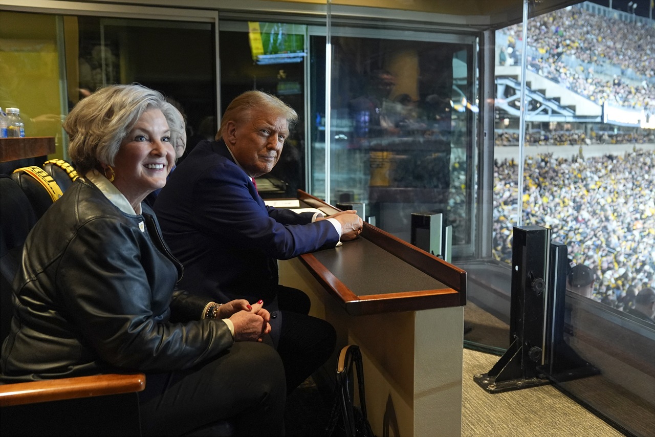 Then-Republican presidential nominee, former President Donald Trump attends a game between the NFL Pittsburgh Steelers and the New York Jets with Susie Wiles on October 20; Wiles was named as White House chief of staff (Photo by POOL / POOL / AFP)