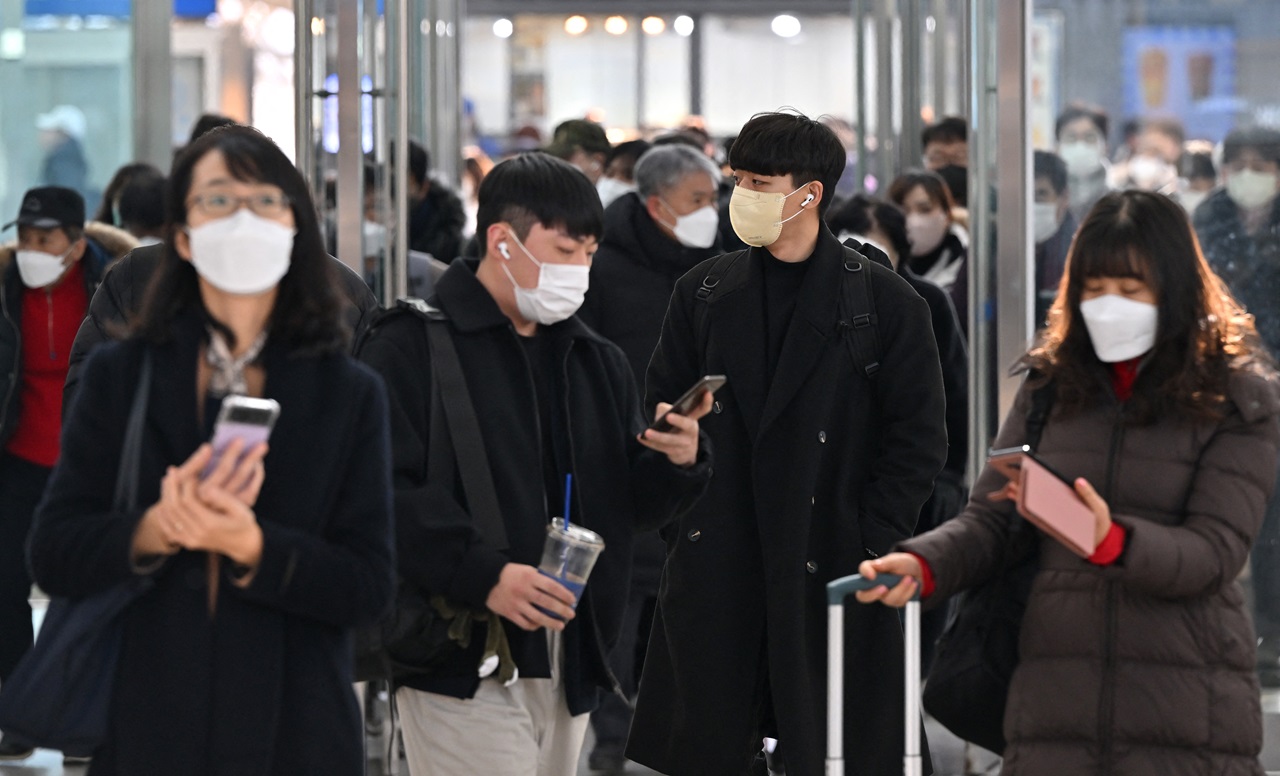 Korean citizens wearing masks during the covid pandemic in 2023. AFP file photo by Jung Yeon-je