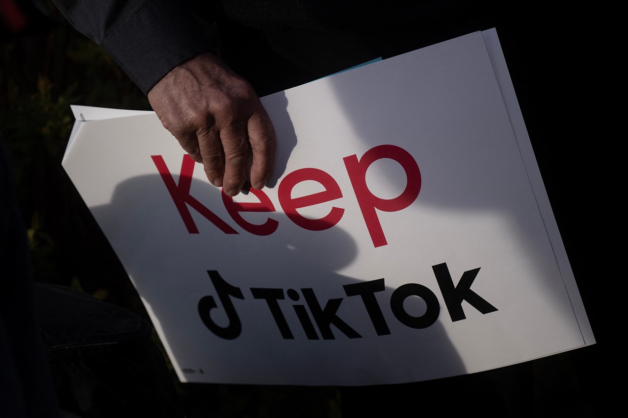 TikTok faces a US ban after an appeals court rejected its challenge to a law requiring the video-sharing app to divest from its Chinese parent company by January 19. The potential ban could strain US-China relations just as president-elect Donald Trump prepares to take office on January 20. (Photo by Brendan Smialowski / AFP)