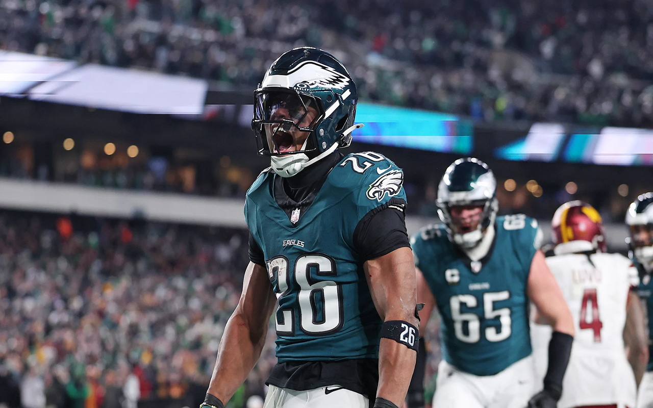 Philadelphia Eagles running back Saquon Barkley (26) celebrates after a touchdown against the Washington Commanders during the second half in the NFC Championship game at Lincoln Financial Field. Photo: Bill Streicher-Imagn Images