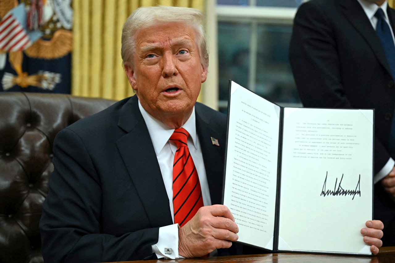 Donald Trump shows a new executive order