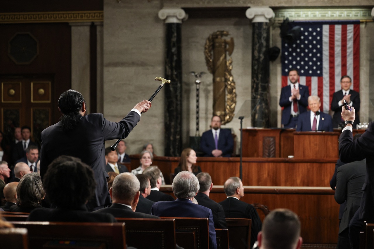 Al Green, R-Texas, points his cane at President Trump