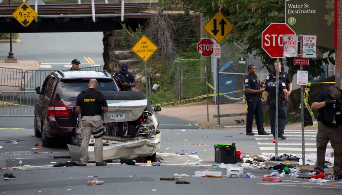 Virginia State Police inspect the site where a vehicle hit protesters in Charlottesville, Virginia, USA, 12 August 2017. EPA/TASOS KATOPODIS