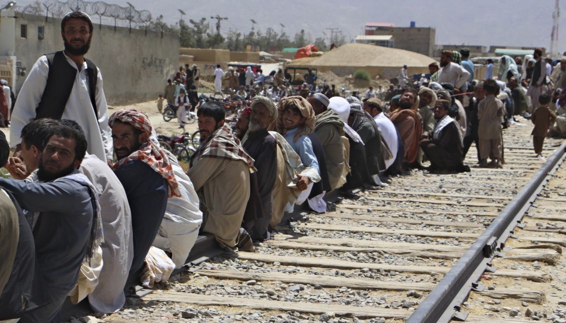 Afghan refugees wait to be processed at a border post in Quetta, Pakistan, on Monday, Aug. 21. EFE/Jamal Taraqai