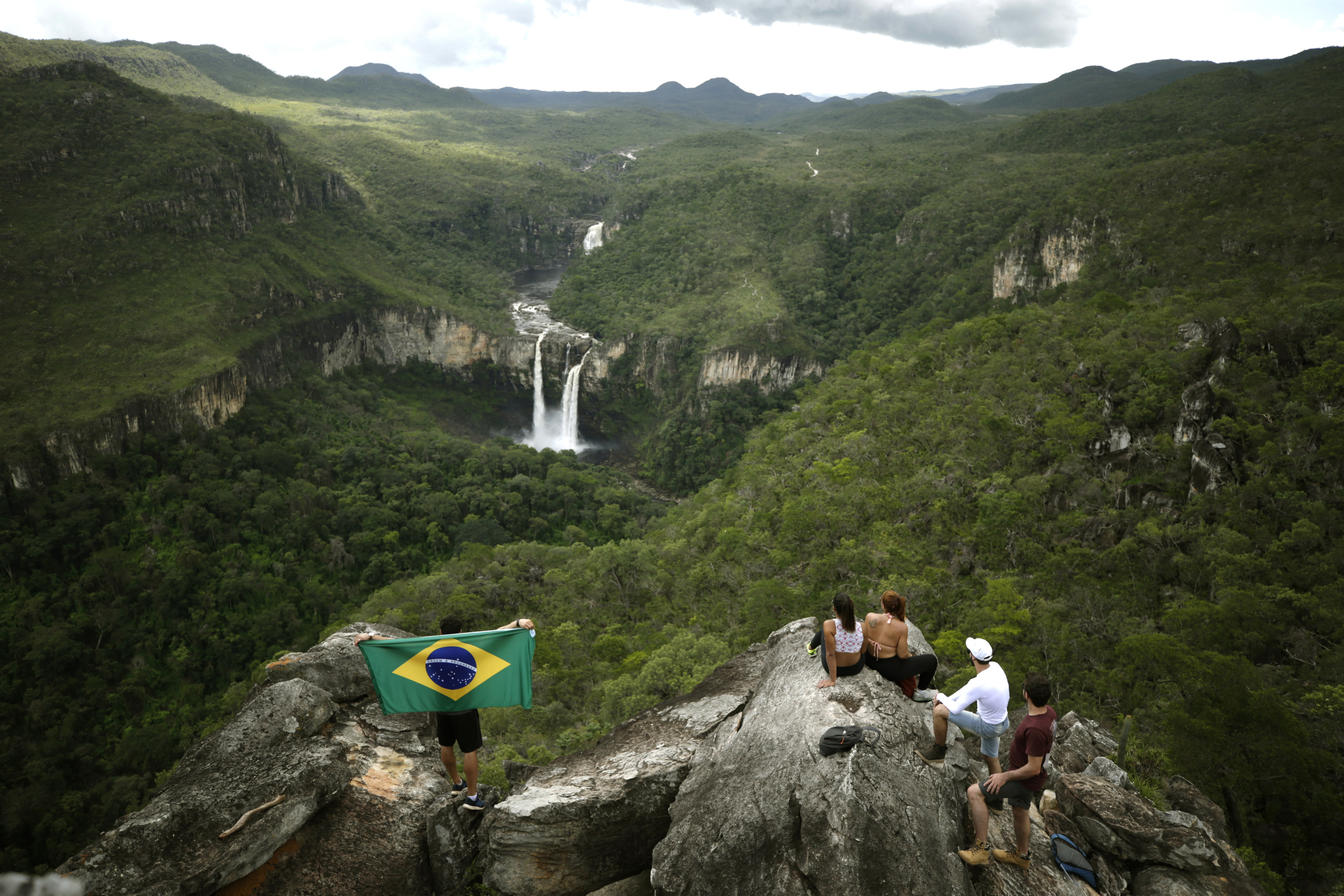 Photo provided on March 23, 2018, showing tourists at Chapada dos Veadeiros National Park, near Sao Jorge, Brazil, March 16, 2018. EPA-EFE/Joedson Alves
