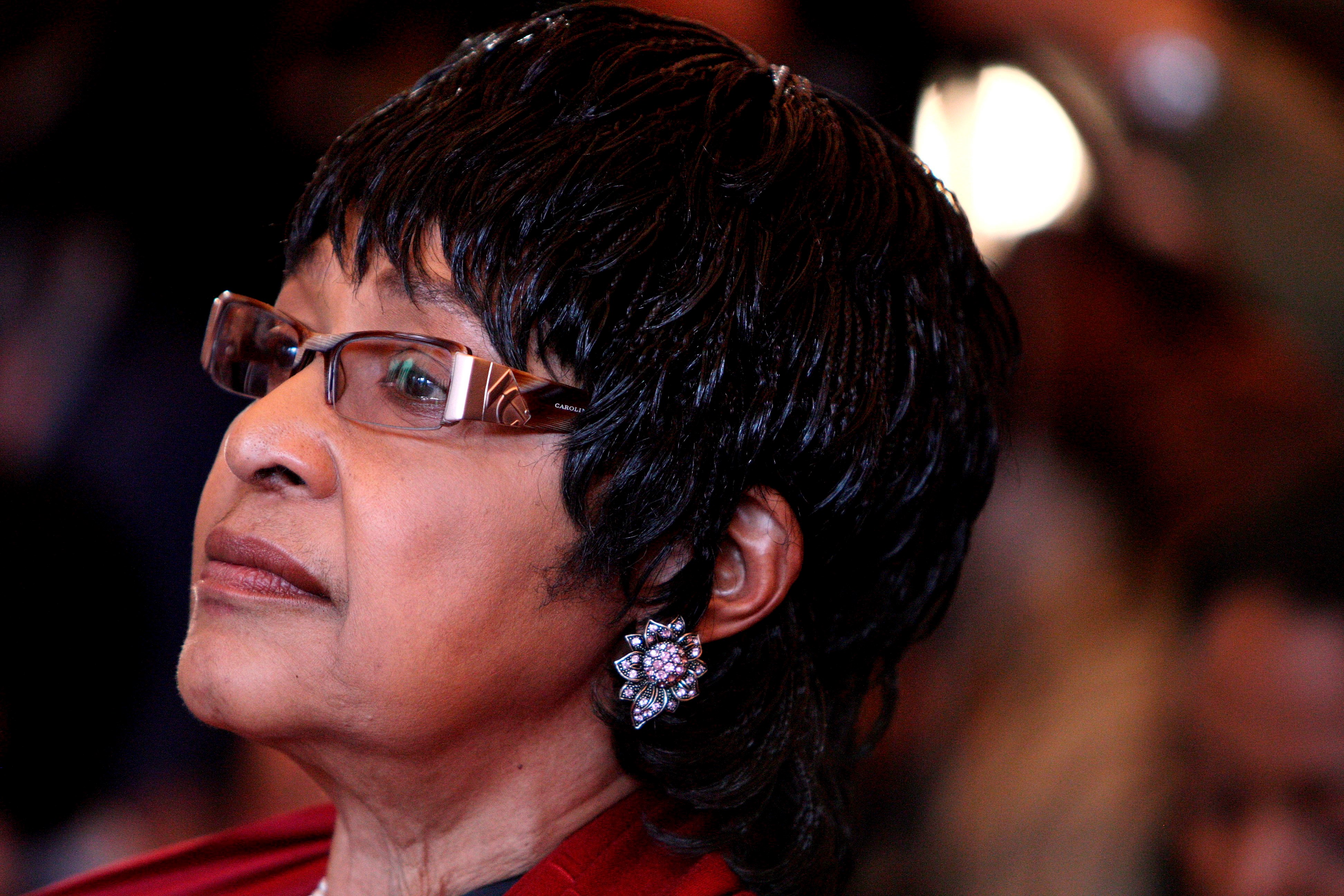 File image of Winnie Madikizela-Mandela listening to a speech at the opening of the Mandela House museum in Soweto, South Africa, Mar. 19, 2009. EPA-EFE FILE/JON HRUSA
