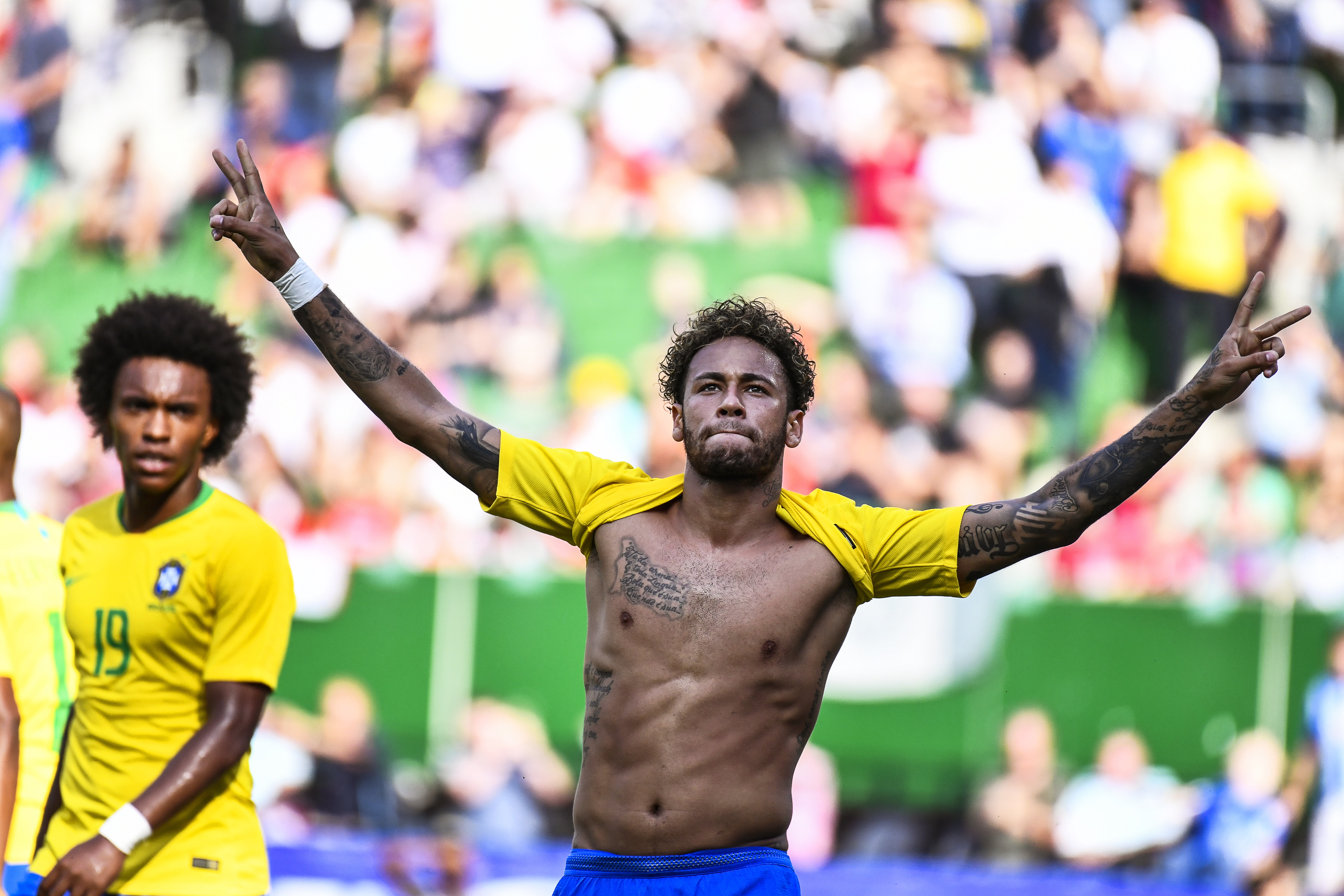 Brazil's Neymar (R) celebrates after scoring the 2-0 lead during the International Friendly soccer match between Austria and Brazil in Vienna, Austria, June 10, 2018. EPA-EFE/CHRISTIAN BRUNA
