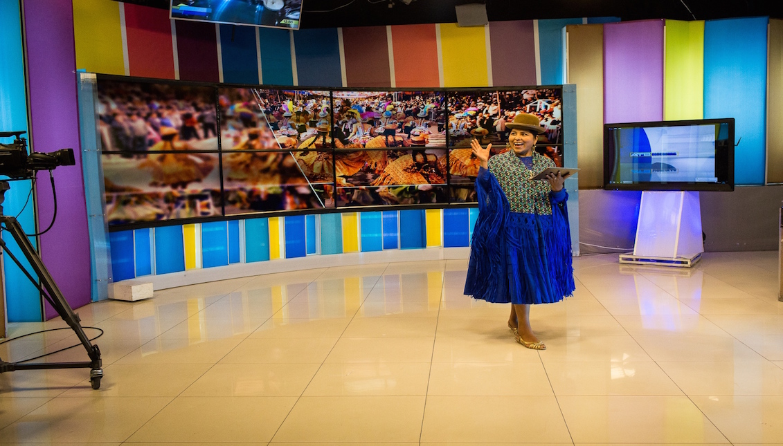 Bertha Acarapi during the news broadcast at ATB Television Studios in La Paz. Photo: Eduardo Leal, "Cholita's Rise"
