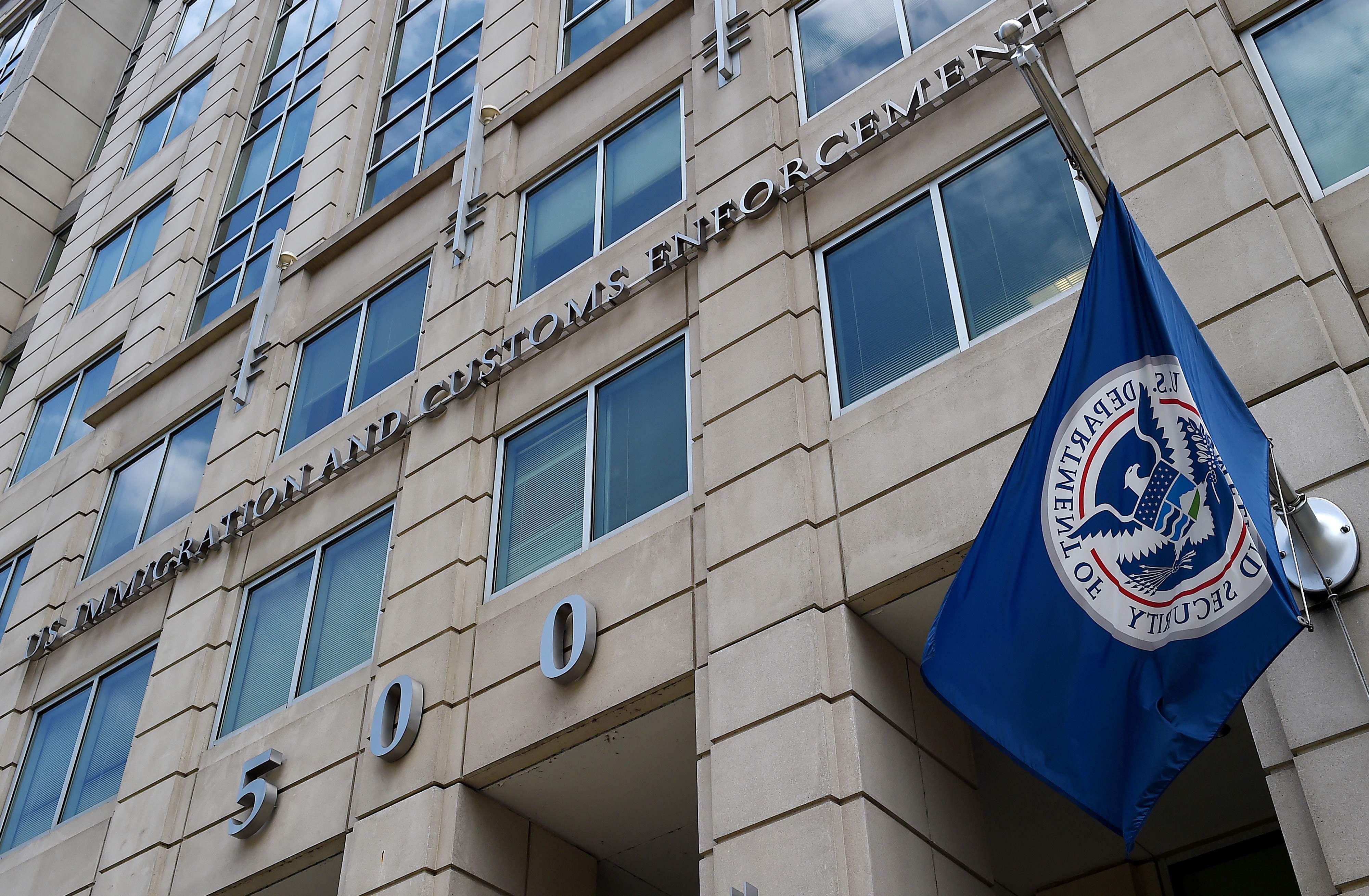 The Department of Homeland Security flag flies outside the Immigration and Customs Enforcement headquarters in Washington. (Olivier Douliery/AFP/Getty Images)