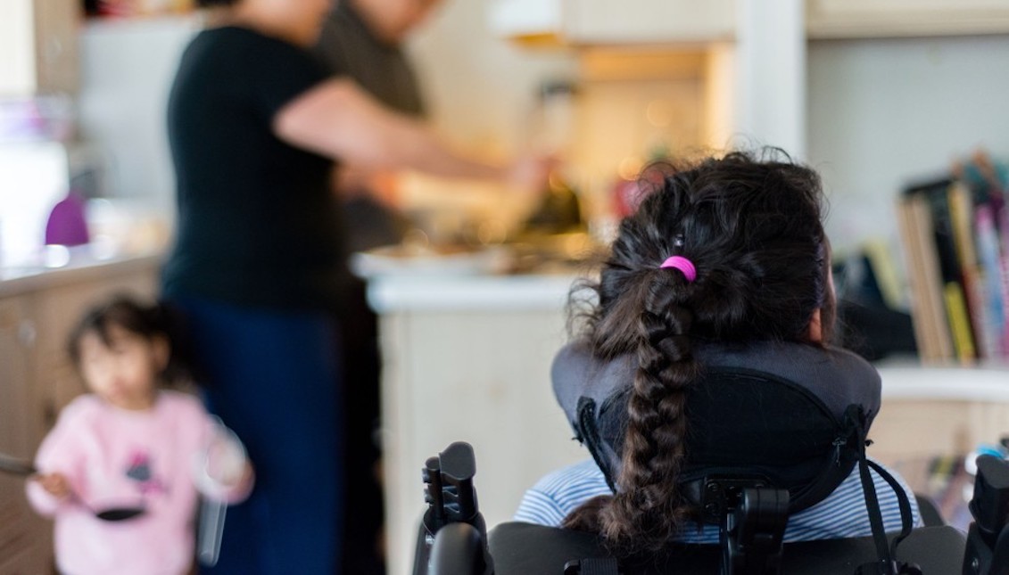 April suffers from childhood cerebral palsy and epilepsy. Her parents have been illegal immigrants for 16 years. Photo: Heidi de Marco/KHN. Source: The Atlantic.