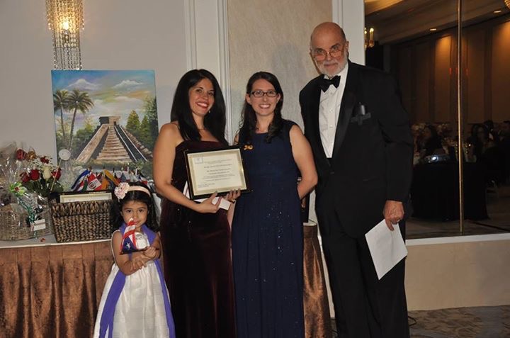 Maria Elisa Smith Gonzales (center) was one of three Latino students awarded a scholarship at the annual SILAMP Gala. (Photo courtesy of Luz Selenia Salas)
