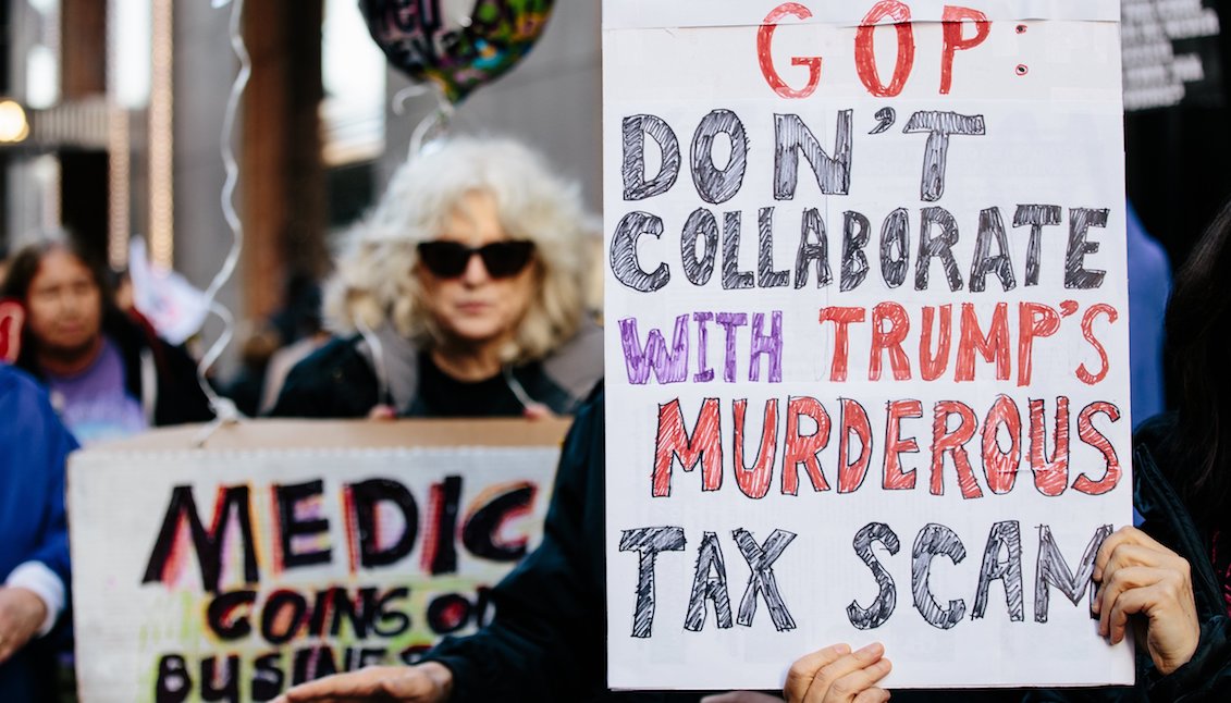 View of a poster during a protest by the Granny Brigade against the tax reform on Tuesday, November 21, 2017, outside the Trump Tower in New York (USA). EFE / ALBA VIGARAY