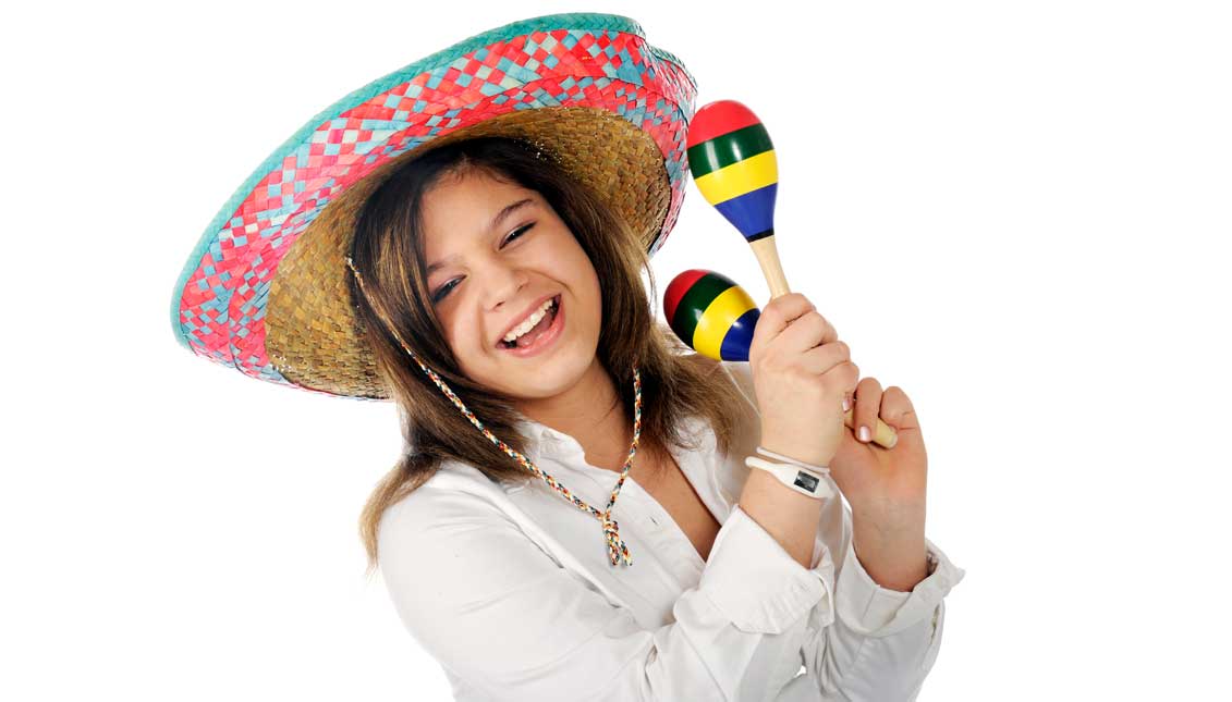 Every May there is an increase in the ridiculousness of the costumes and advertising tie-ins for non-Hispanics to revel in -- and, perversely, it seems to coincide with how poorly actual Mexicans are treated in this country. File