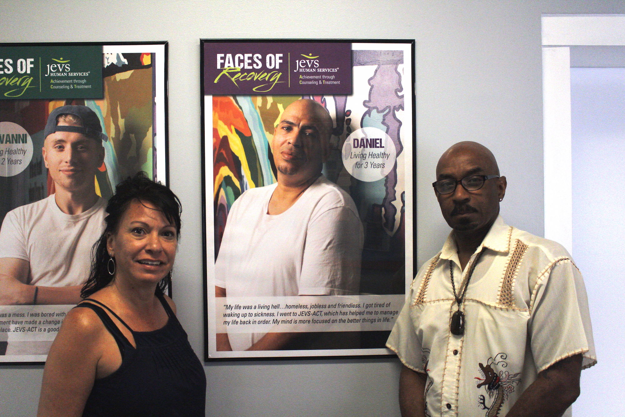 Maria Delgado and Sam Cole pose with a picture of Daniel Gonzalez. They are two of the key staff members for JEVS' new job training program for recovering addicts. Photo: Nigel Thompson/AL DÍA News.