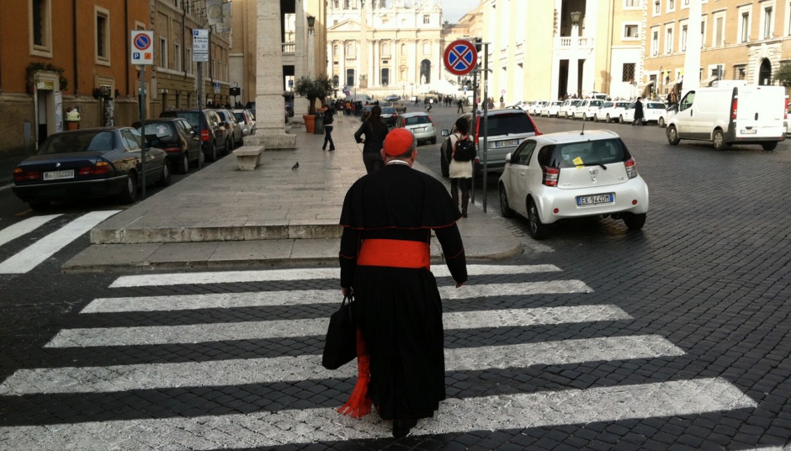 A cardinal walks through the the streets of the Vatican on his way to a meeting prior to the election of Pope Francis. March 5, 2013. Photo: © Alberto Vourvoulias
