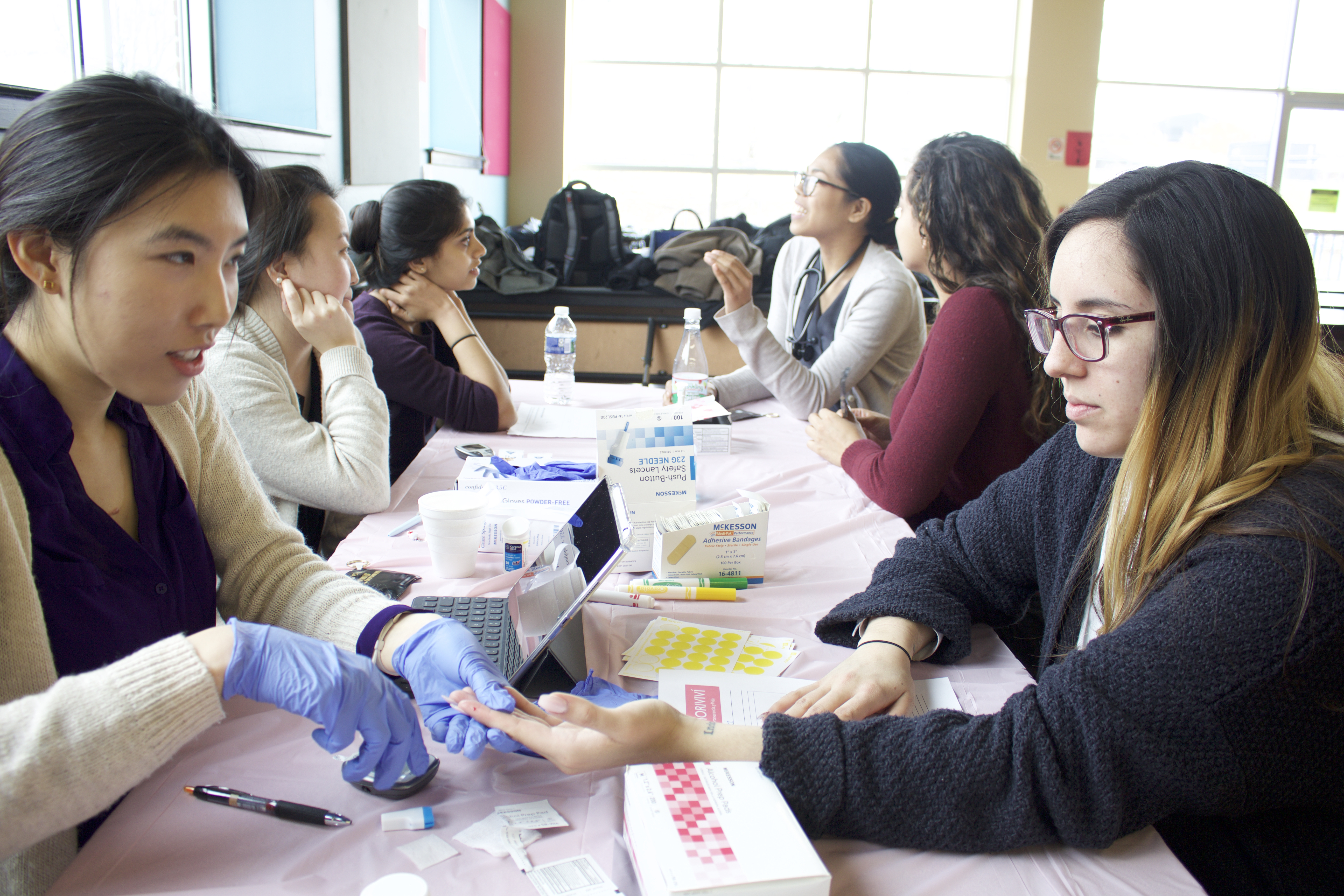 Students at the Latino health fair on March 10. Photo: Emily Neil / AL DIA News