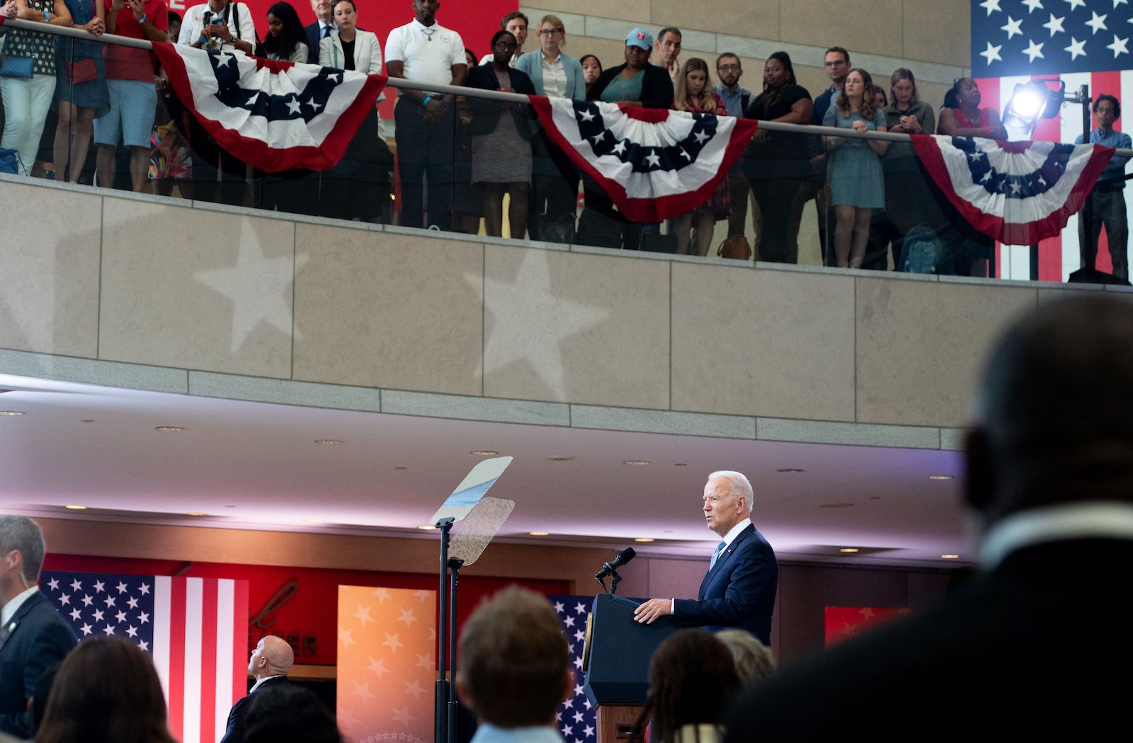 People listen as US President Joe Biden speaks about voting rights at the National Constitution Center in Philadelphia, Pennsylvania, July 13, 2021. (Photo by SAUL LOEB / AFP) (Photo by SAUL LOEB/AFP via Getty Images)