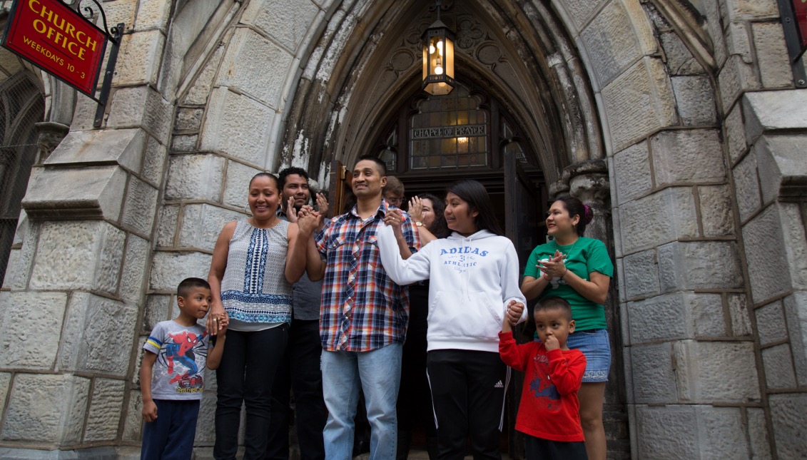 Javier Flores García, with his family, members of the organization Together and the Rev. Robin Hynicka, at the entrance of the United Methodist Church, Center City. Photo: Samantha Laub/AL DÍA News