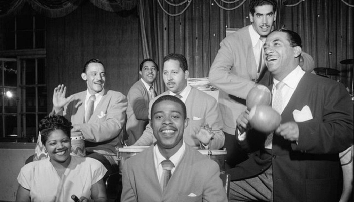 Machito appears in this photo on the right playing the maracas. His name was Francisco Raúl Gutiérrez Grillo. He impacted the New York musical world with Mario Bauzá, the musical director of his orchestra. Getty Images