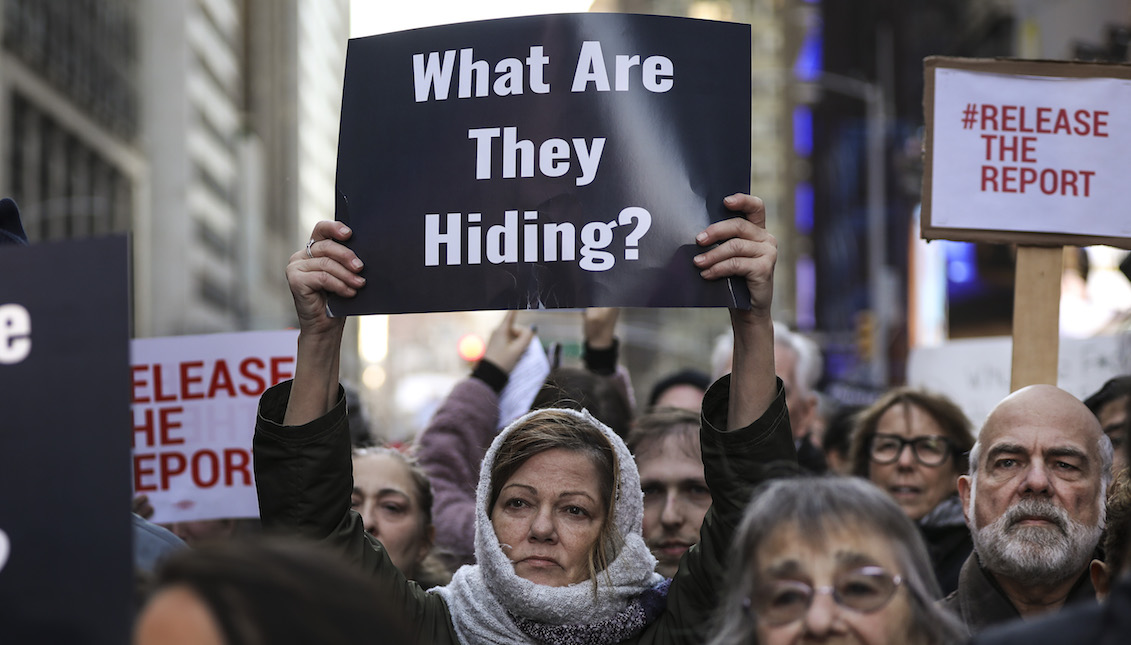 NEW YORK, NY - APRIL 4: Activists participate in a 'Release the Report' rally in Times Square, April 4, 2019 in New York City. Democratic political activist groups MoveOn.org and Indivisible hosted rallies in several U.S. cities to call on U.S. Attorney General William Barr to 'immediately release Special Counsel Robert Mueller's report on alleged Russian meddling in the 2016 presidential election. (Photo by Drew Angerer/Getty Images)