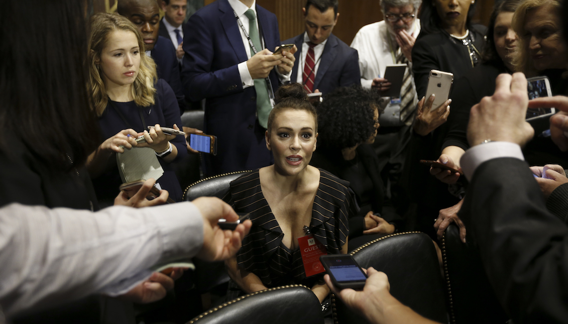 WASHINGTON, DC - SEPTEMBER 27: Actress Alyssa Milano talks to media before the Senate Judiciary Committee hearing on the nomination of Brett Kavanaugh to be an associate justice of the Supreme Court of the United States, on Capitol Hill September 27, 2018 in Washington, DC. (Photo By Michael Reynolds-Pool/Getty Images)