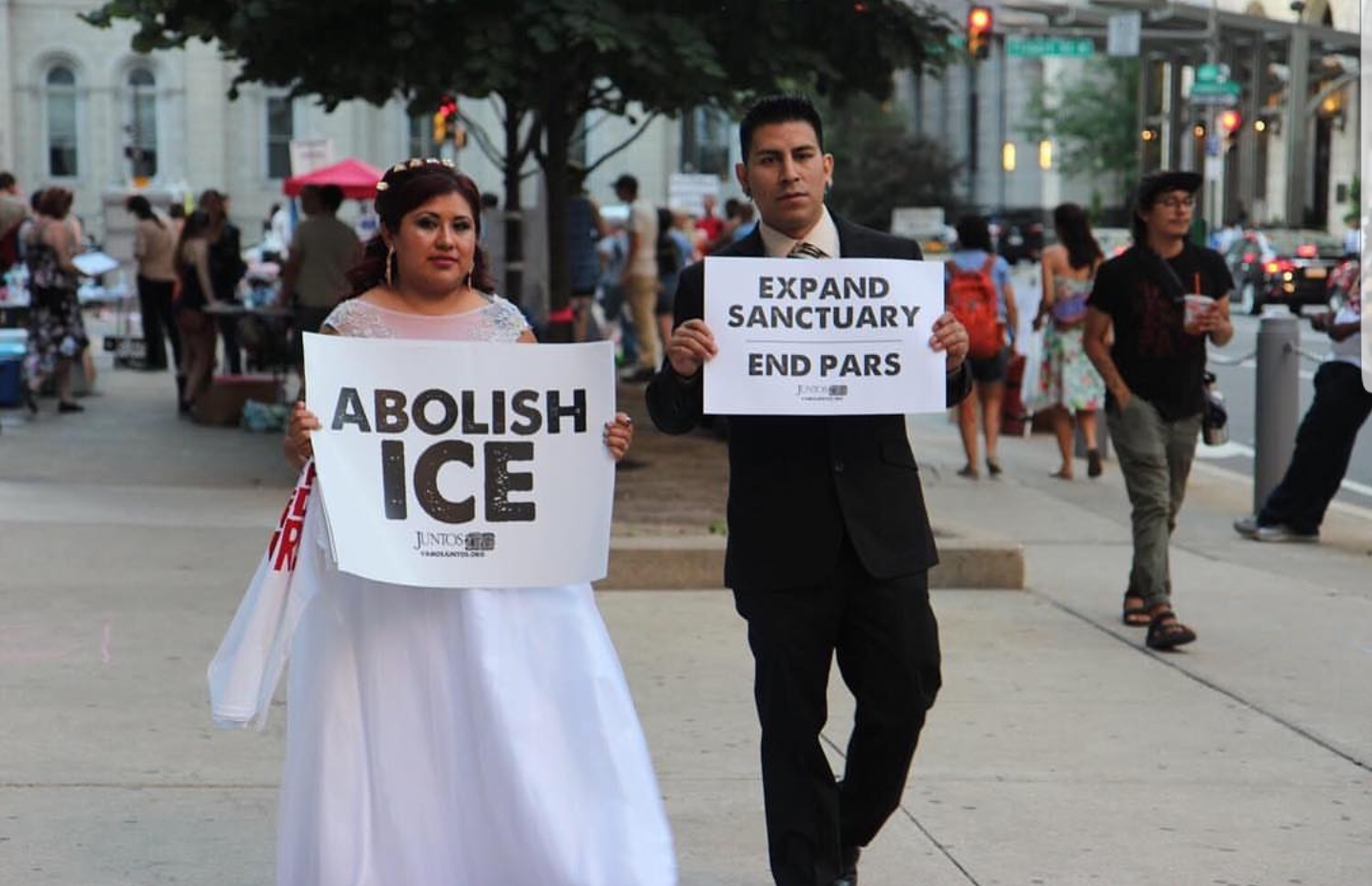 Linda Hernández visited the Abolish ICE encampment on her wedding day, prior to the city's decision to end the PARS contract with ICE. Photo: Courtesy of Juntos
