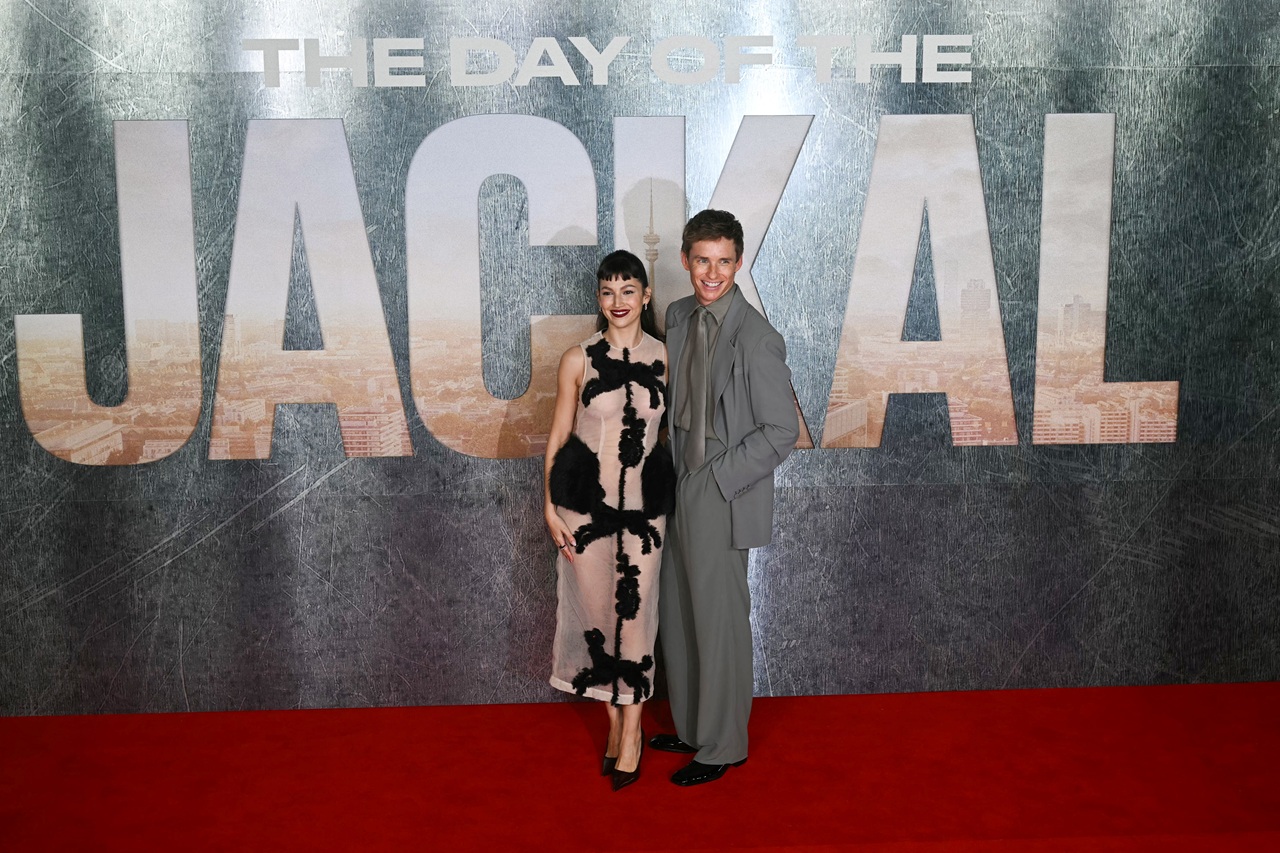 British actor Eddie Redmayne (R) and Spanish actress Ursula Corbero pose on the red carpet upon arrival for the UK premier for the movie "The day of Jackal" at the Queen Elizabeth Hall, Southbank, in London, on October 22, 2024. (Photo by JUSTIN TALLIS / AFP)