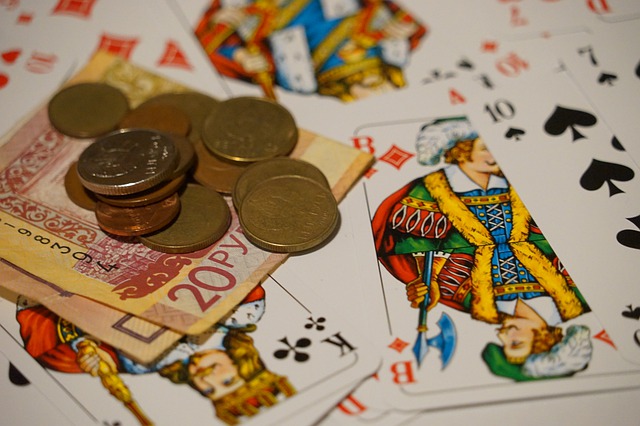 Coins and cards to illustrate note on risk capital 