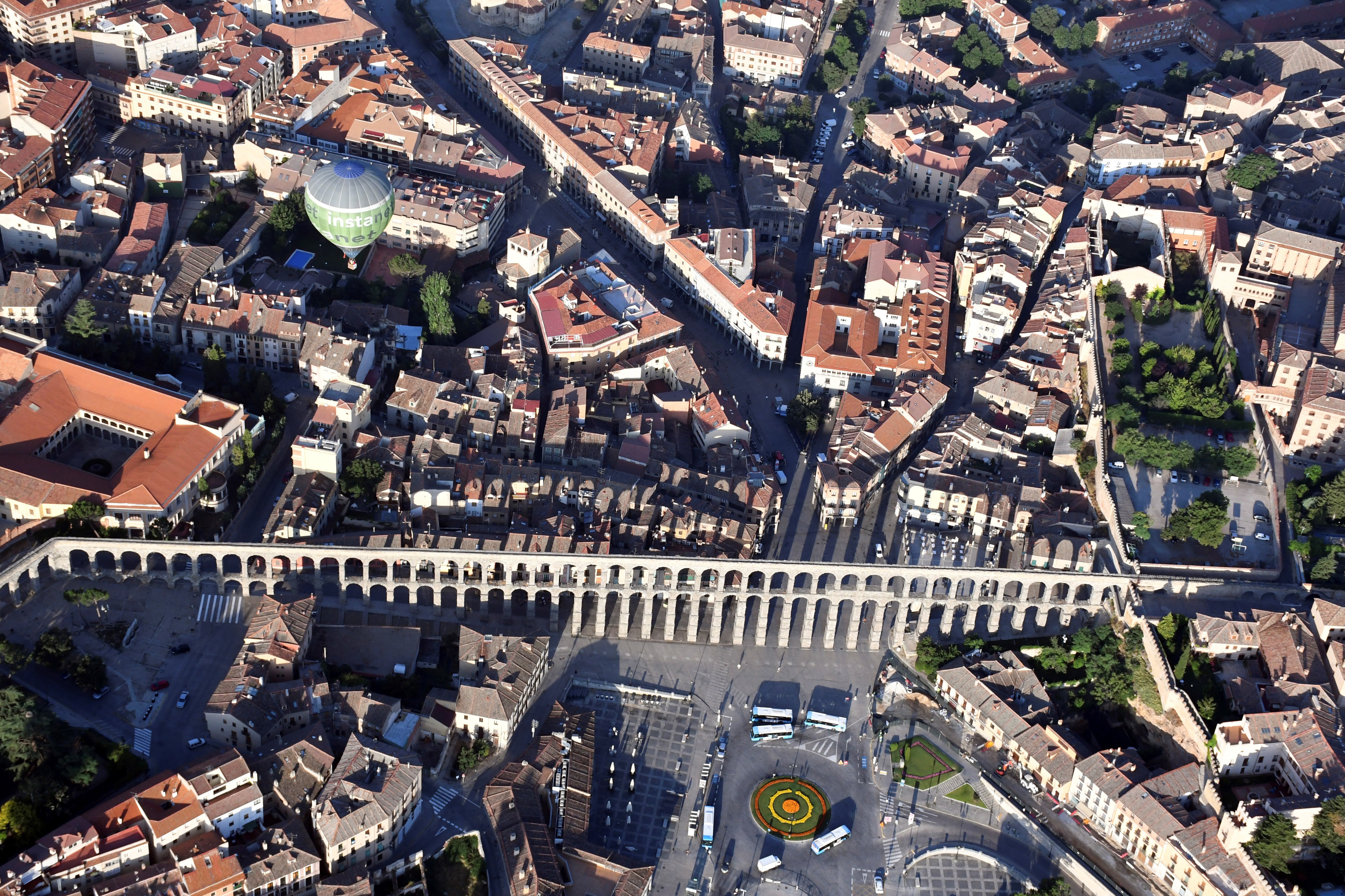 A balloon flies over the Roman Aqueduct of Segovia during the first Balloon Accessible Festival in Segovia, Spain, July 20, 2018. EPA-EFE/PABLO MARTIN