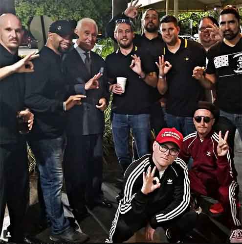 Tarrio and Proud Boys with Roger Stone doing the WP sign for White Power. Photo: Afrocubanweb. 