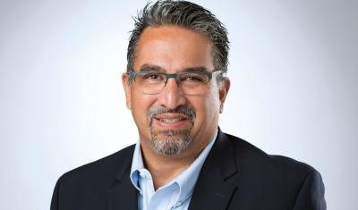 A Latino, top Comcast executive