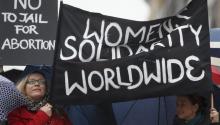 Demonstrators in Belgium protest women's rights. EPA/OLIVIER HOSLET
