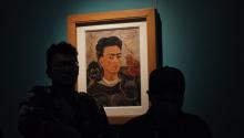 Visitors observe the work "Autorretrato con changuitos" on Tuesday, July 4, 2017, at the "Me pinto a mi misma" exhibition of the Mexican painter Frida Kahlo, to commemorate the 110th anniversary of her birth, at the Museo Dolores Olmedo that will open to the public this exhibition on July 6, 2017 in Mexico City (Mexico). EFE/Sáshenka Gutiérrez
